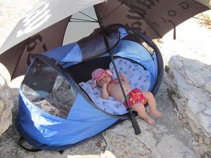Greta in her Pack and play on the Kamenjak  Croatia beach